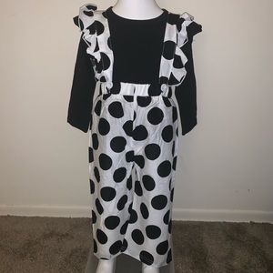 Black and white polka dot suspender pants